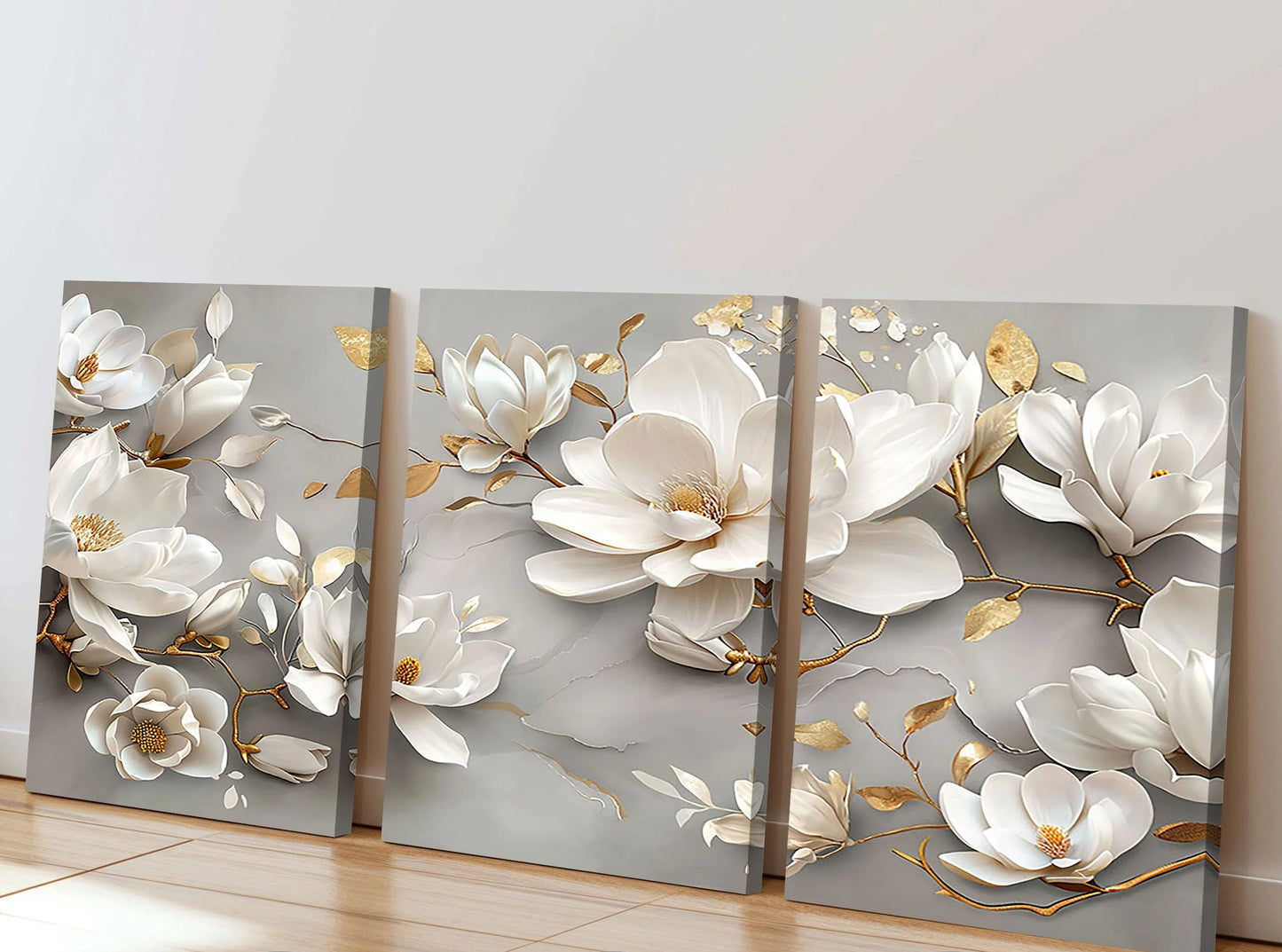 Triptych floral artwork with white flowers and gold accents on a gray background