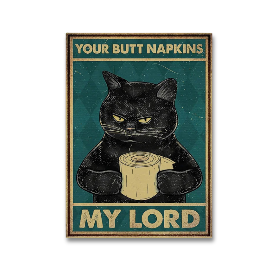 A rectangular novelty sign featuring a black cat holding a roll of napkins, with the text 'YOUR BUTT NAPKINS' at the top and 'MY LORD' at the bottom, shown on a plain white background.