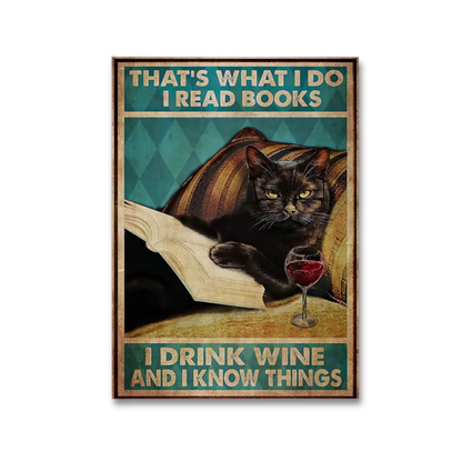 A vintage-style humorous poster featuring a black cat reading a book and holding a glass of red wine, with the text 'THAT'S WHAT I DO I READ BOOKS' at the top and 'I DRINK WINE AND I KNOW THINGS' at the bottom.