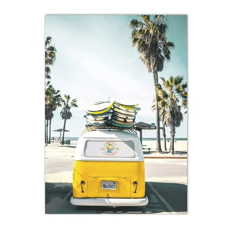 yellow travel car with surfboard by California ocean beach canvas wall art