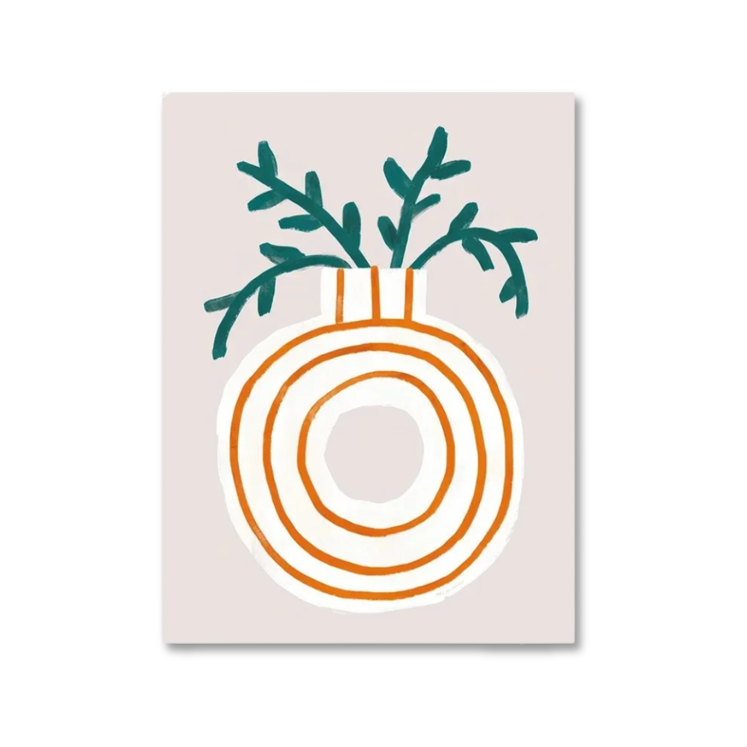 A minimalist art print featuring a stylized orange ornament with green leafy branches on a pale pink background, shown as a vertical rectangular print on a white backdrop.