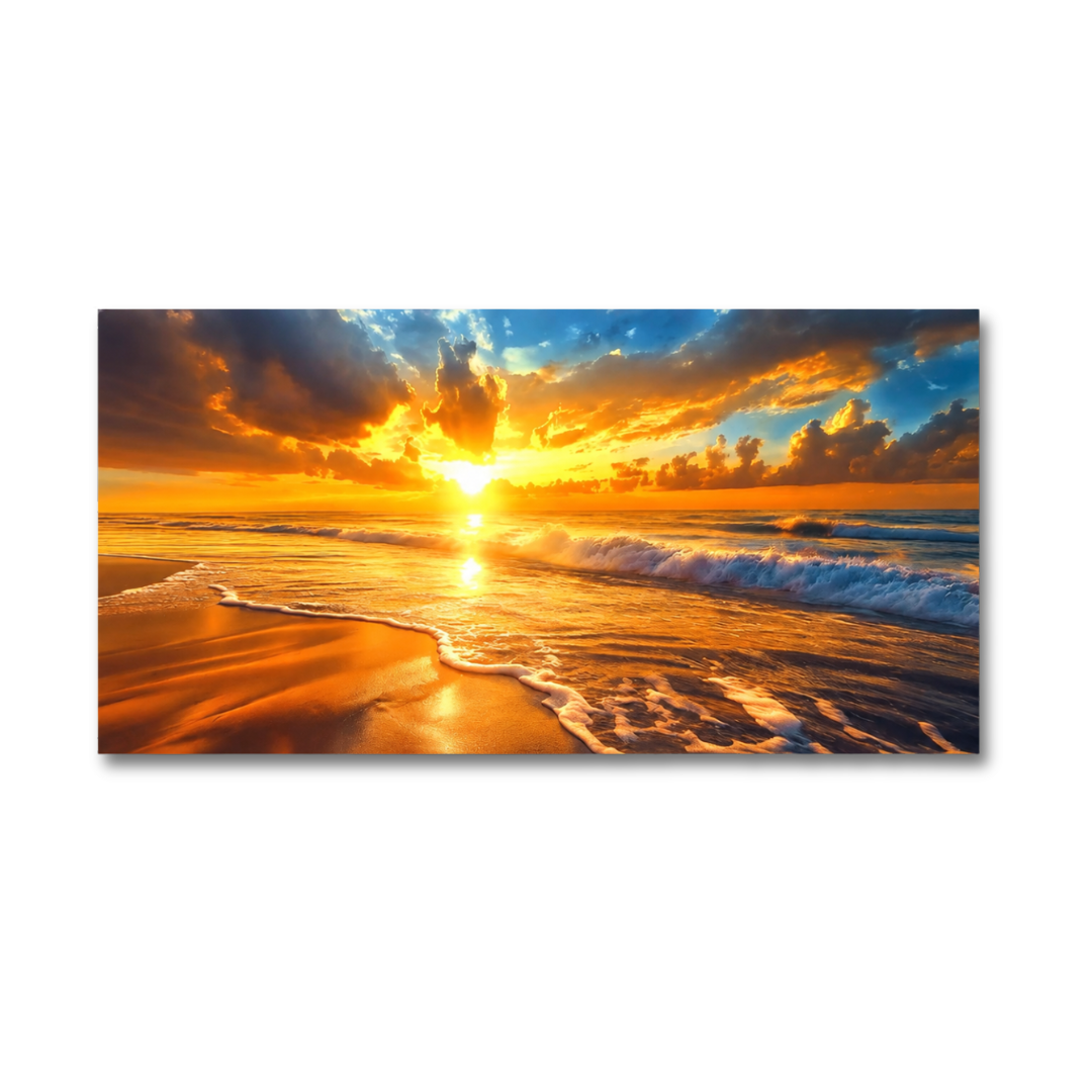 A rectangular wall art print or canvas showing a dramatic beach sunset with glowing orange and yellow sunlight, dark clouds, blue sky, and foamy ocean waves, displayed against a plain white background.