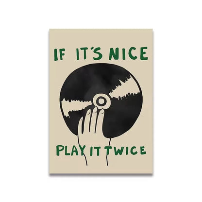 unframed canvas with quote if it’s nice play it twice and vintage record player