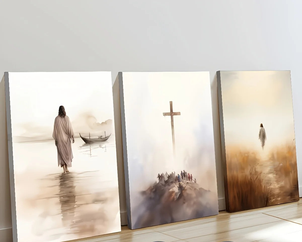 Three artistic wall hangings depicting religious scenes on a wooden floor.