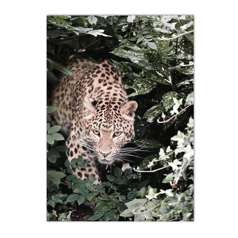 leopard in tropical jungle with palm and monstera leaves on canvas