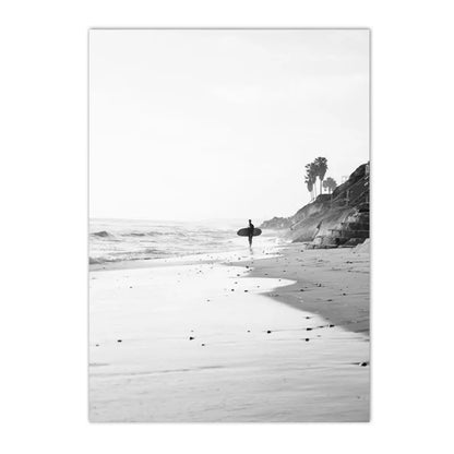 black and white beach scene girl holding surfboard canvas