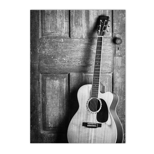 black and white new york themed still life canvas with guitar and camera