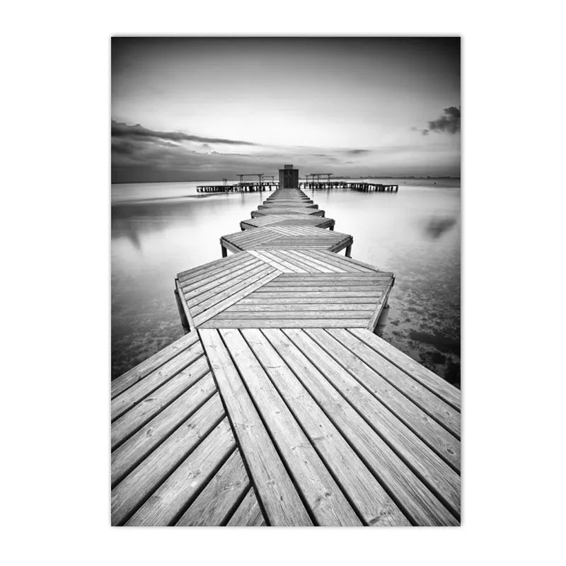 black and white Nordic landscape with mountains, lake, boat, bridge and waterfall