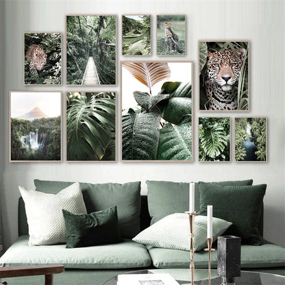 leopard in tropical jungle with palm and monstera leaves on canvas