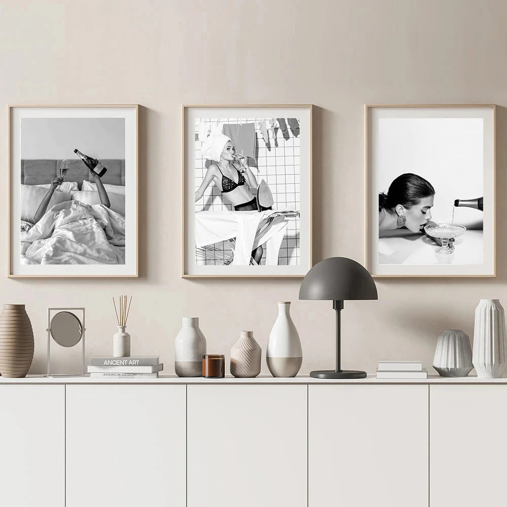 black and white fashion woman holding drink canvas wall art