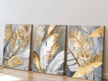 Set of three wall art pieces with gold and silver leaf designs on a neutral background.