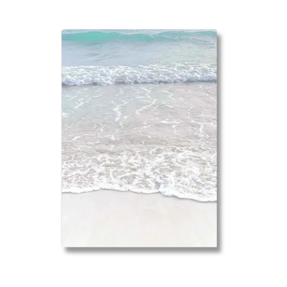 A vertical canvas wall art print depicting a serene beach scene with turquoise ocean waves washing onto pale sand, shown against a plain white background.