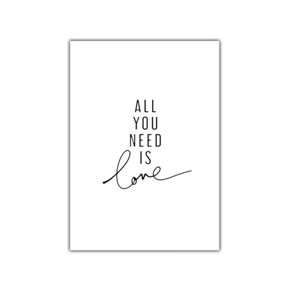 A minimalist typographic wall art print with the phrase 'ALL YOU NEED IS love' in black text on a white rectangular print, shown against a light gray background.